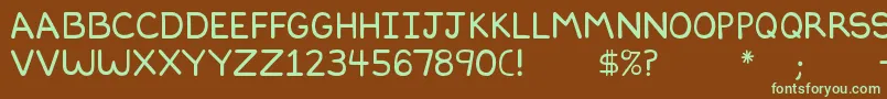 Dilbertfont2-fontti – vihreät fontit ruskealla taustalla