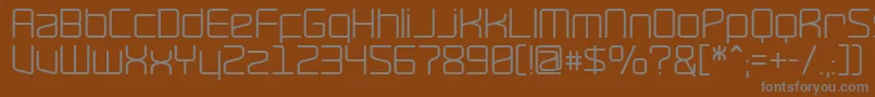 Ravepps-fontti – harmaat kirjasimet ruskealla taustalla