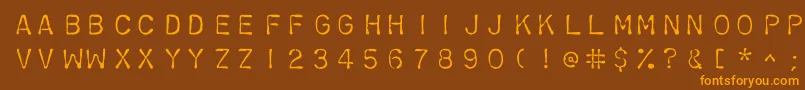 フォントChromosomelight – オレンジ色の文字が茶色の背景にあります。