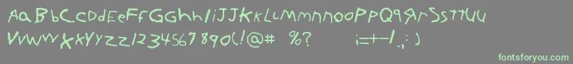 フォントKornnetTooItFtl – 灰色の背景に緑のフォント