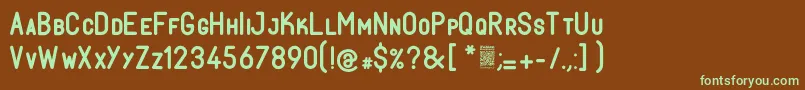 フォントFabioloSmallcapSemibold – 緑色の文字が茶色の背景にあります。