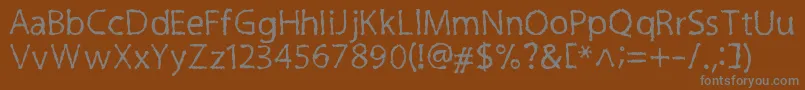 フォントInkyCre – 茶色の背景に灰色の文字