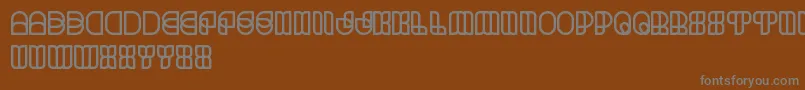 ScienceFiction-fontti – harmaat kirjasimet ruskealla taustalla