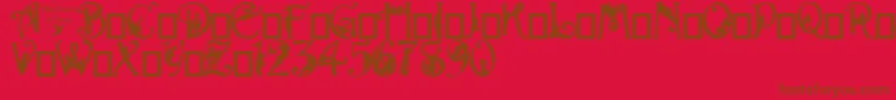 フォントAlphaSilouette – 赤い背景に茶色の文字