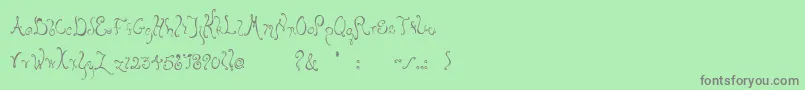 Bellyfish Font – Gray Fonts on Green Background