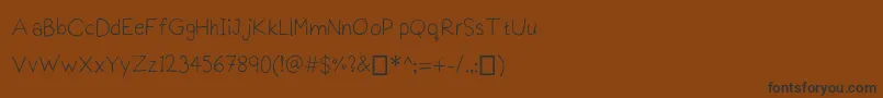 Шрифт Praktiscript – чёрные шрифты на коричневом фоне