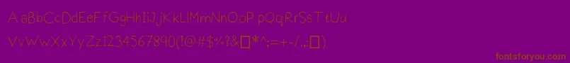 Fonte Praktiscript – fontes marrons em um fundo roxo