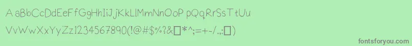 Шрифт Praktiscript – серые шрифты на зелёном фоне