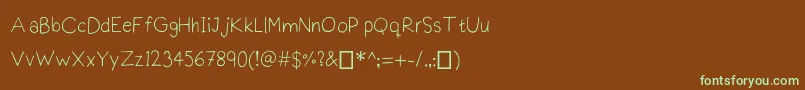 Praktiscript-fontti – vihreät fontit ruskealla taustalla