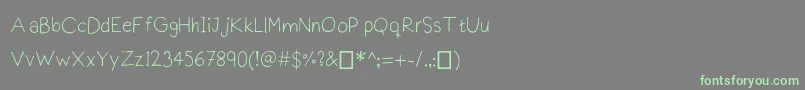 Praktiscript Font – Green Fonts on Gray Background