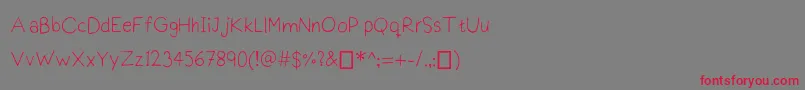 Praktiscript-fontti – punaiset fontit harmaalla taustalla