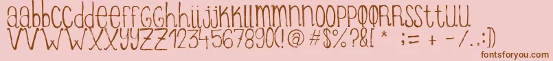 Шрифт ItziargobigRegular – коричневые шрифты на розовом фоне
