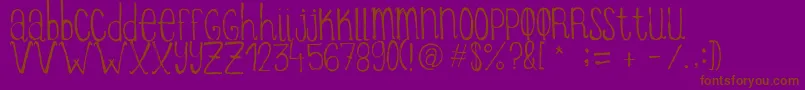 ItziargobigRegular-fontti – ruskeat fontit violetilla taustalla
