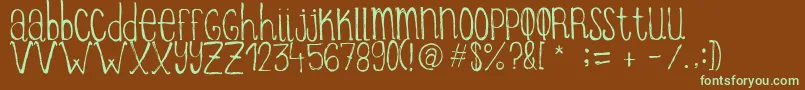 ItziargobigRegular Font – Green Fonts on Brown Background