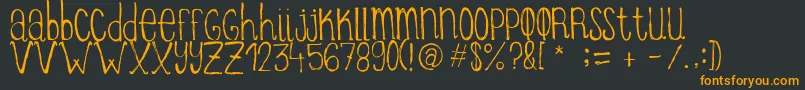 Шрифт ItziargobigRegular – оранжевые шрифты на чёрном фоне