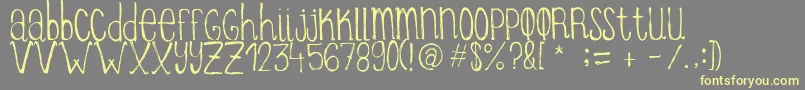 ItziargobigRegular Font – Yellow Fonts on Gray Background