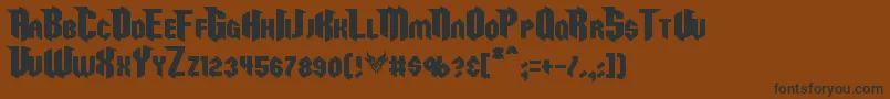 Razorclaw Font – Black Fonts on Brown Background