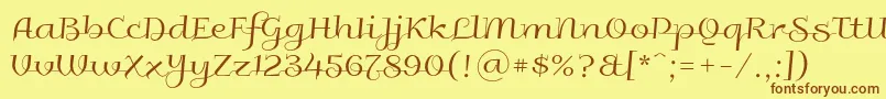 フォントGalberik – 茶色の文字が黄色の背景にあります。