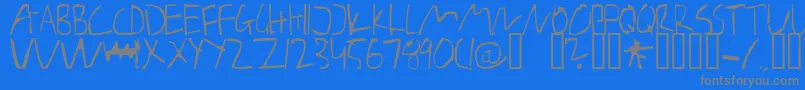 Weitere Informationen zur BarelyManilow-Schriftart BarelyManilow-Schriftart – Graue Schriften auf blauem Hintergrund