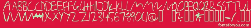 BarelyManilow Font – Green Fonts on Red Background