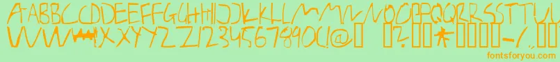 BarelyManilow Font – Orange Fonts on Green Background