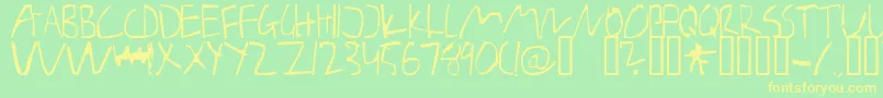 BarelyManilow Font – Yellow Fonts on Green Background