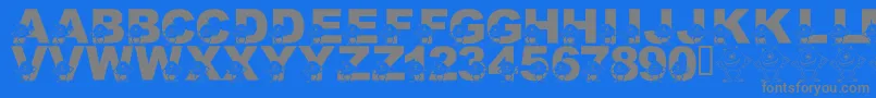 LmsGooglyBear-fontti – harmaat kirjasimet sinisellä taustalla