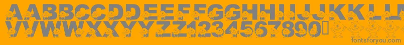 Czcionka LmsGooglyBear – szare czcionki na pomarańczowym tle