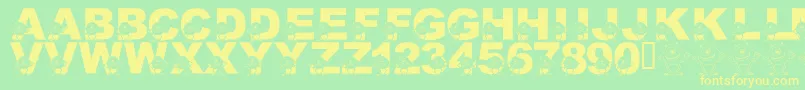 LmsGooglyBear-Schriftart – Gelbe Schriften auf grünem Hintergrund
