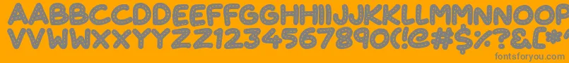 CuteStitch-Schriftart – Graue Schriften auf orangefarbenem Hintergrund