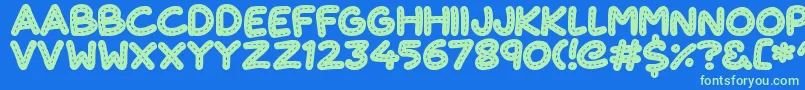 CuteStitch Font – Green Fonts on Blue Background