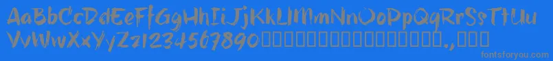 HillbellyTrial-fontti – harmaat kirjasimet sinisellä taustalla