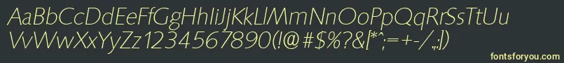 SaxonyserialXlightItalic-fontti – keltaiset fontit mustalla taustalla
