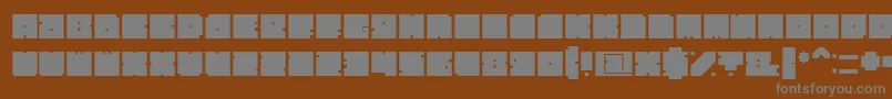 Czcionka BlockBold – szare czcionki na brązowym tle