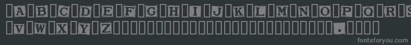 フォントSmarganaWakes – 黒い背景に灰色の文字