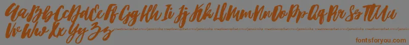 Hubster Font – Brown Fonts on Gray Background
