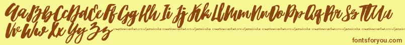 Hubster Font – Brown Fonts on Yellow Background