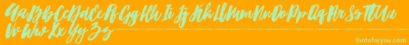 Hubster Font – Green Fonts on Orange Background