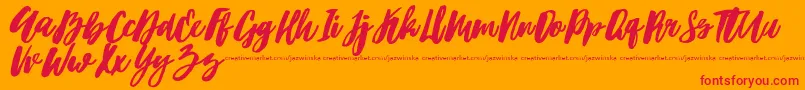 Hubster Font – Red Fonts on Orange Background