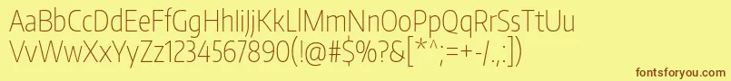 EncodesanscompressedThin-fontti – ruskeat fontit keltaisella taustalla