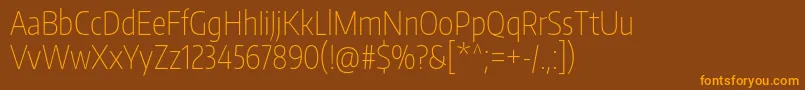 Czcionka EncodesanscompressedThin – pomarańczowe czcionki na brązowym tle