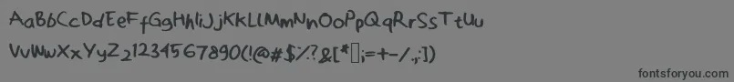 Zakwanoebit-Schriftart – Schwarze Schriften auf grauem Hintergrund