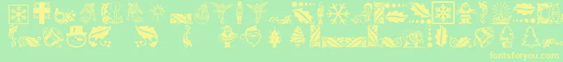 フォントXmasicons – 黄色の文字が緑の背景にあります