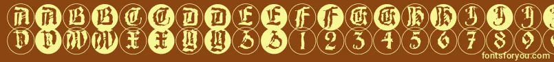 BarlosRandomrings-fontti – keltaiset fontit ruskealla taustalla