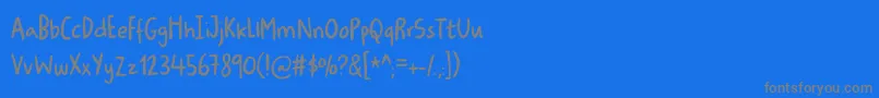 Ugiftigdemo-fontti – harmaat kirjasimet sinisellä taustalla