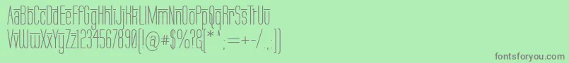 フォントLabtopOverscore – 緑の背景に灰色の文字