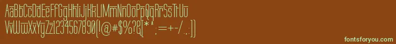 フォントLabtopOverscore – 緑色の文字が茶色の背景にあります。