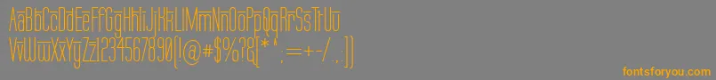 フォントLabtopOverscore – オレンジの文字は灰色の背景にあります。