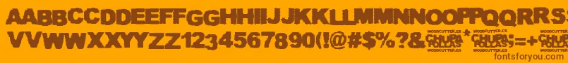 Chupapollas Font – Brown Fonts on Orange Background