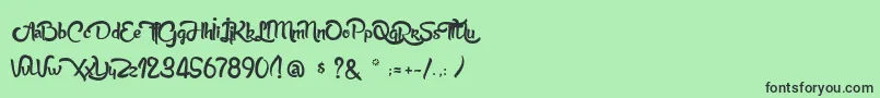 AnabelleScriptLight-Schriftart – Schwarze Schriften auf grünem Hintergrund